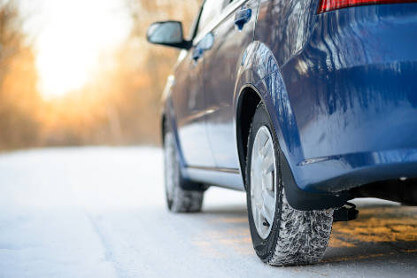 car-driving-on-snowy-road